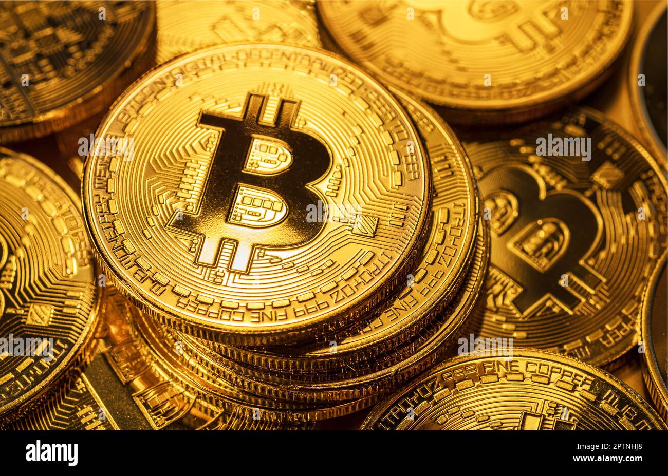 Gold bitcoin coins. Conceptual picture of digital money. Stock Photo