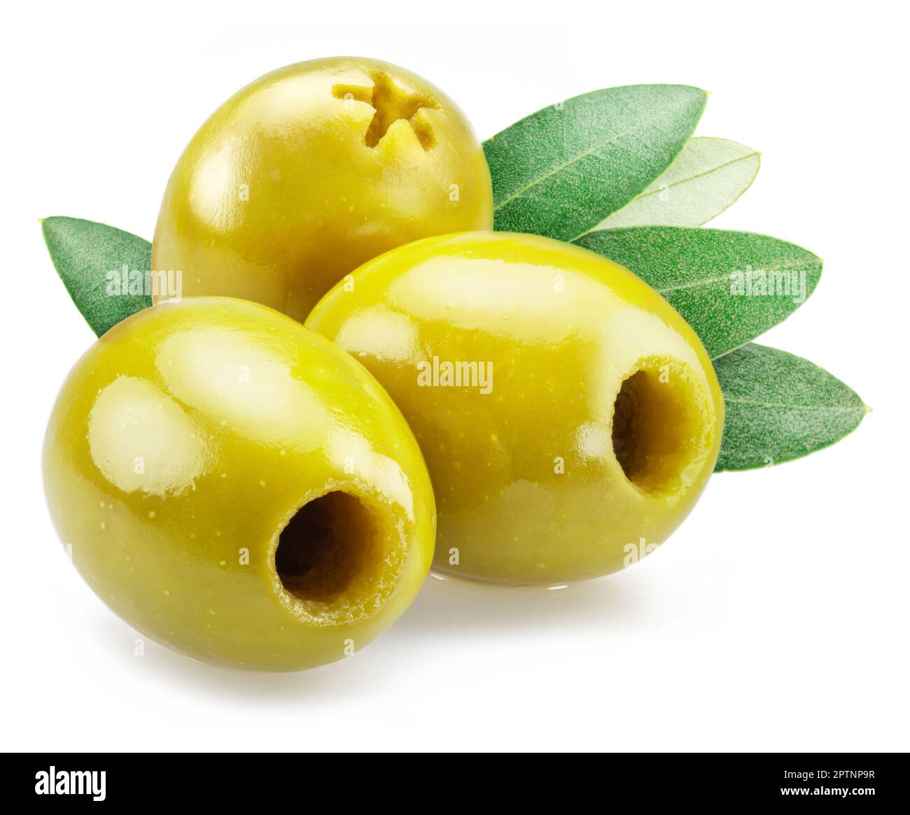 Three pitted green olives with olive leaves isolated on white