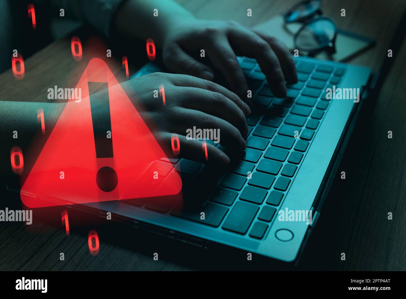 Woman solving cyber attacks on laptop. Compromised information concept. Malicious software, virus, cybercrime attacks. Warning alert about hacker. Stock Photo