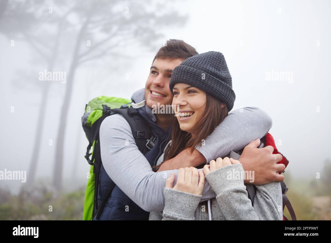 Growing closer to each other in nature. an affectionate young couple ...