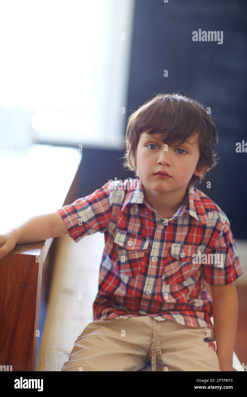 Let them be little. a cute little boy looking at the camera Stock Photo ...
