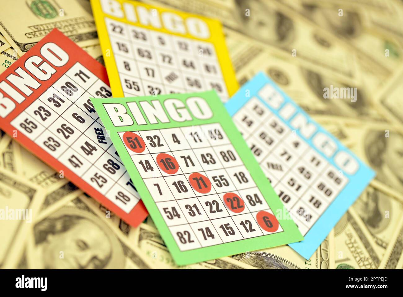 Many bingo boards or playing cards for winning chips and big amount of