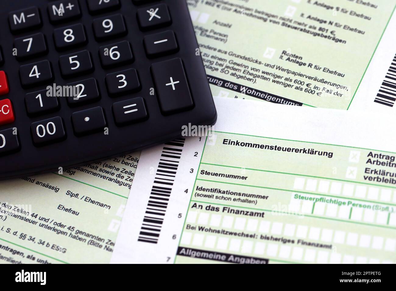 German annual income tax return declaration and calculator lies on  accountant table close up. The concept of taxpaying period in Germany and  Europe Stock Photo - Alamy