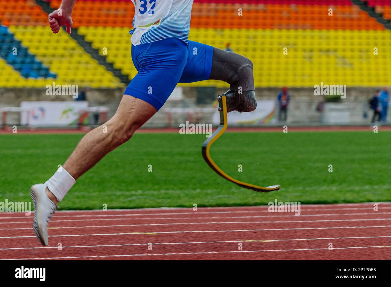 male runner para athlete on limb deficiency running track stadium, summer para athletics championships Stock Photo