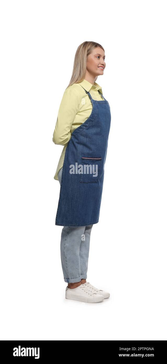 Beautiful young woman in denim apron on white background Stock Photo ...