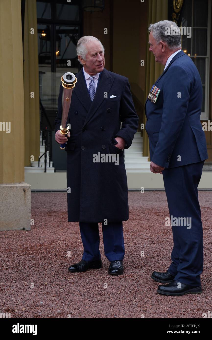 Britain's King Charles III greets Kristin Scott Thomas, left, and Christian  Louboutin, as he attends the Animal Ball at Lancaster House, in London,  Wednesday, June 28, 2023, to mark the 20th anniversary