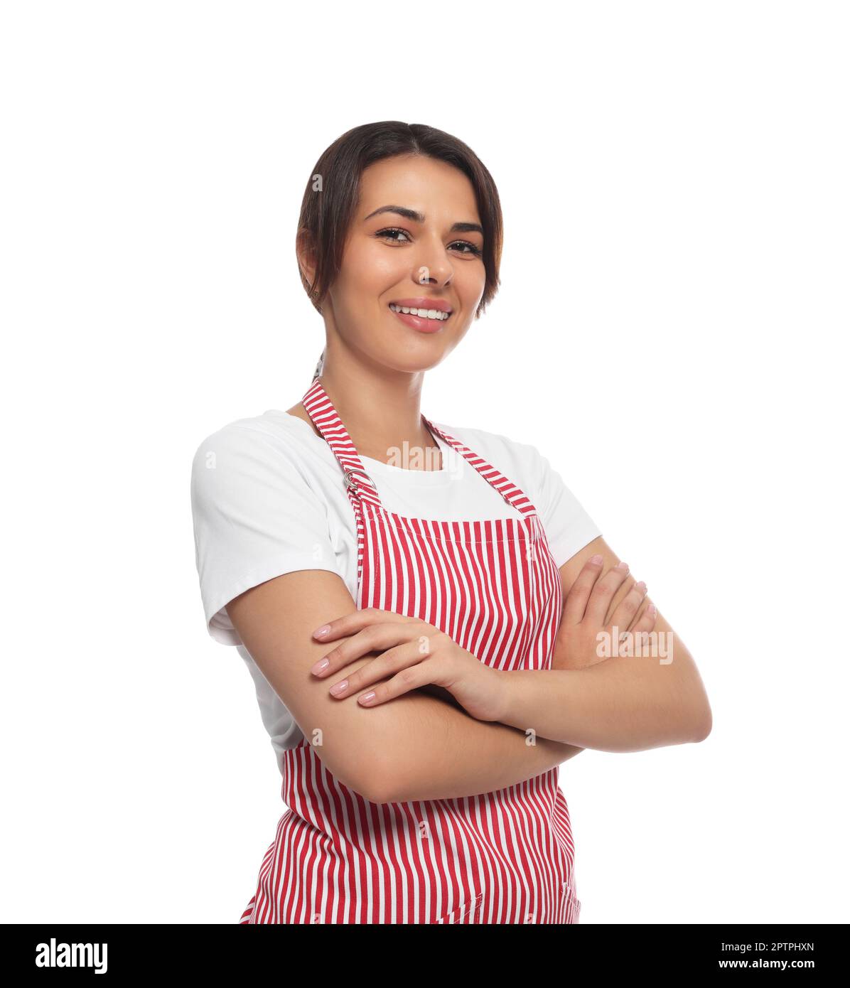 Young woman in red striped apron on white background Stock Photo - Alamy