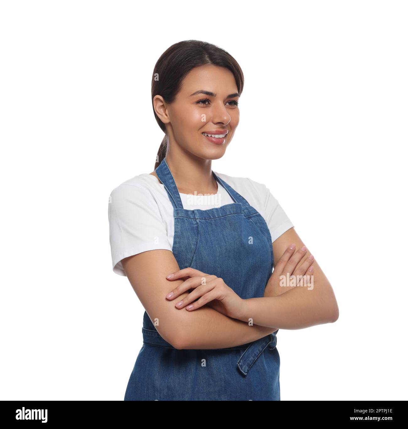 Young woman in blue apron on white background Stock Photo - Alamy