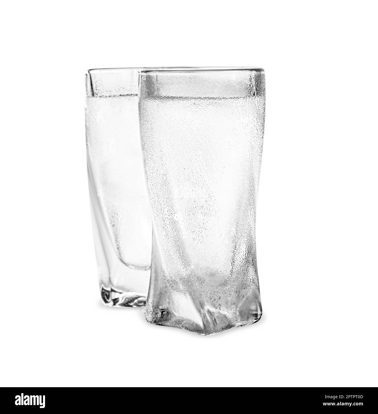 Vodka in shot glasses on white background Stock Photo