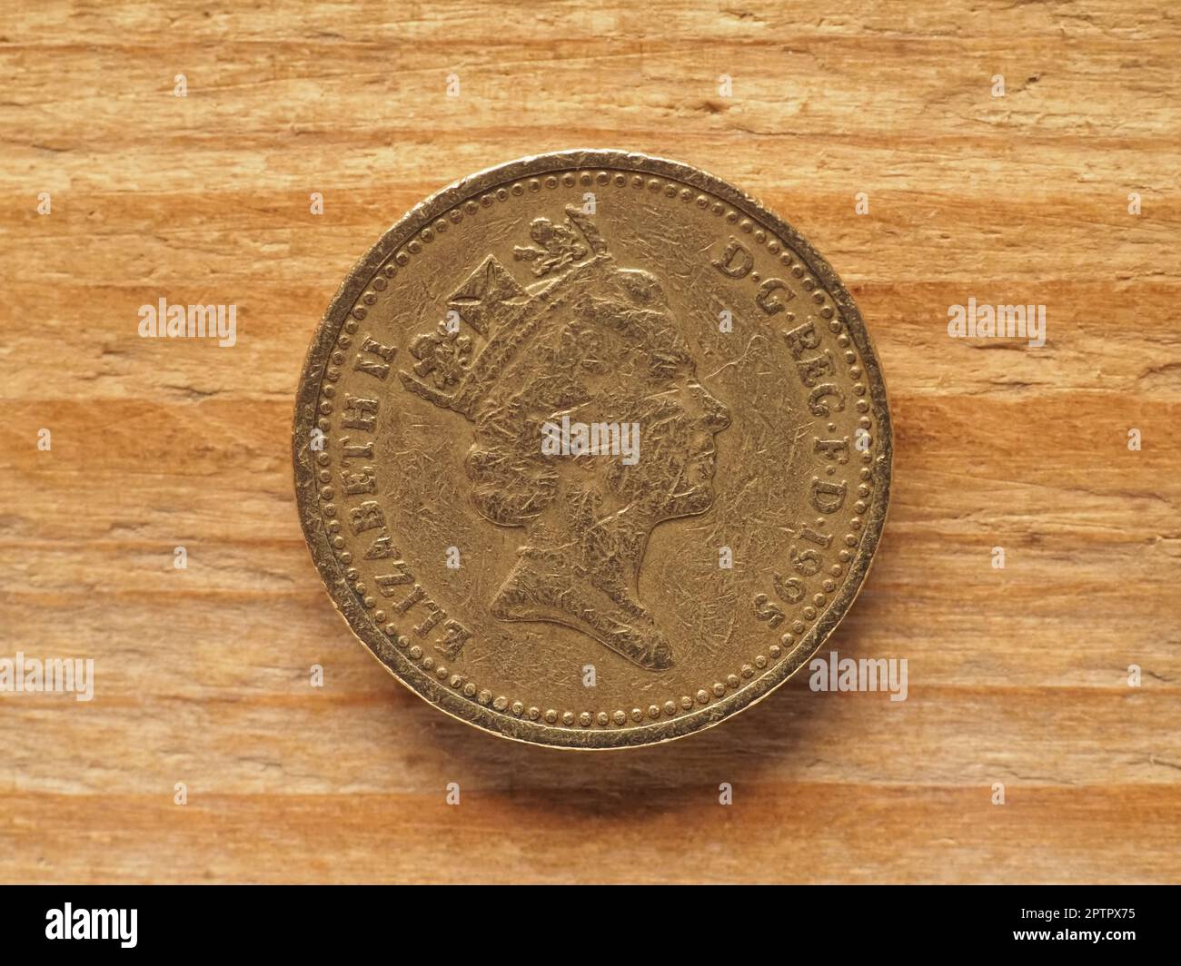 LONDON, UK - CIRCA 2022: one pound coin obverse side showing a portrait of the Queen Elizabeth II, currency of the United Kingdom Stock Photo