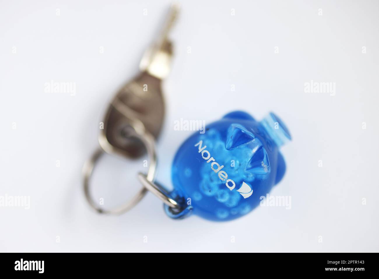 Signs and symbols, a key ring with a Nordea logo on it Stock Photo - Alamy