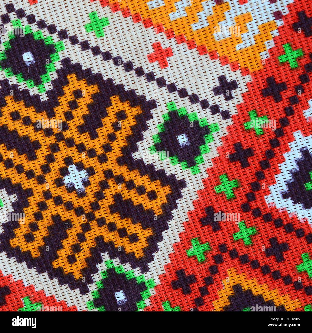 Traditional Ukrainian folk art knitted embroidery pattern on textile