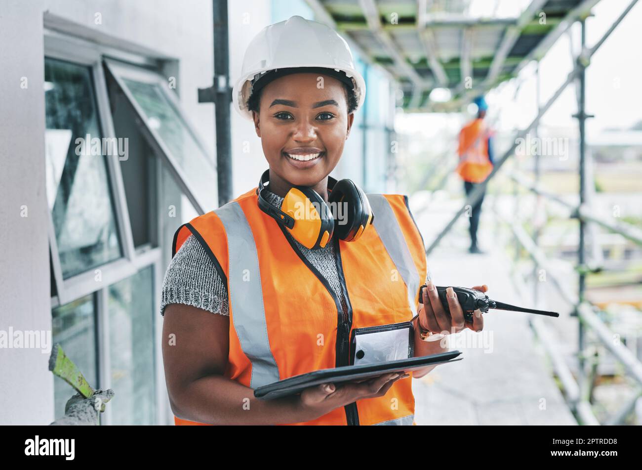 Portrait of proud black construction worker leading with power while