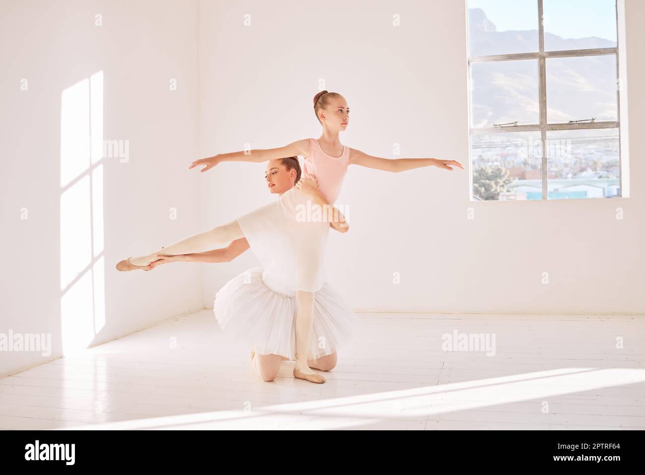 Fitness, support and ballet teacher training ballerina, helping with  posture and balance in a dance studio. Flexible girl practice routine for  elegant Stock Photo - Alamy