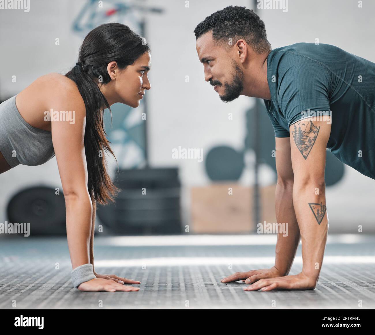 Fitness, gym and training couple doing an exercise workout and living ...
