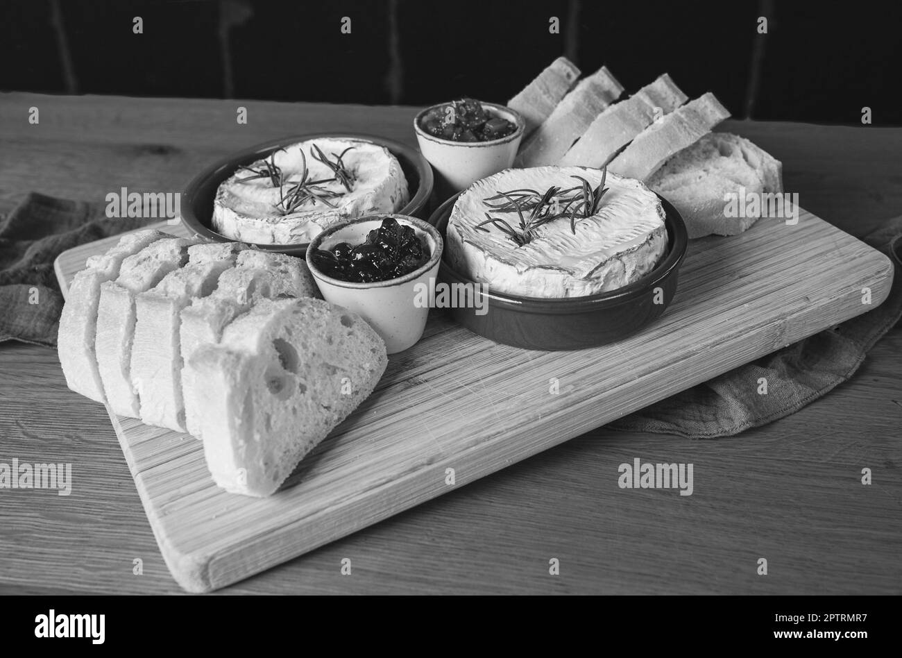 A cheese Board with Camembert, Pickle and Bread (Black and White Image ... A cheese Board with Camembert, Pickle and Bread (Black and White Image ...