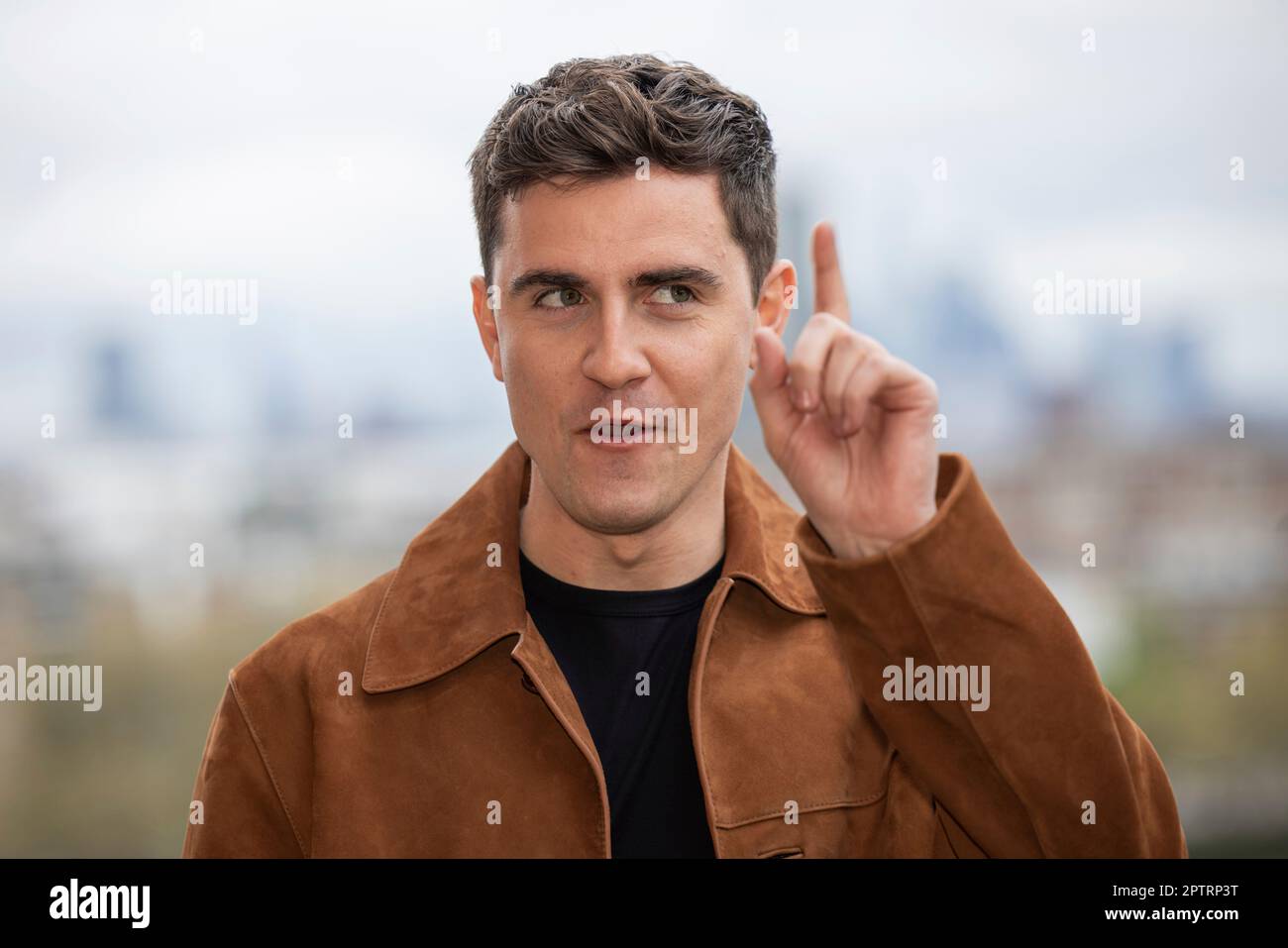 Billy Harris poses for photographers during a photo call to promote the