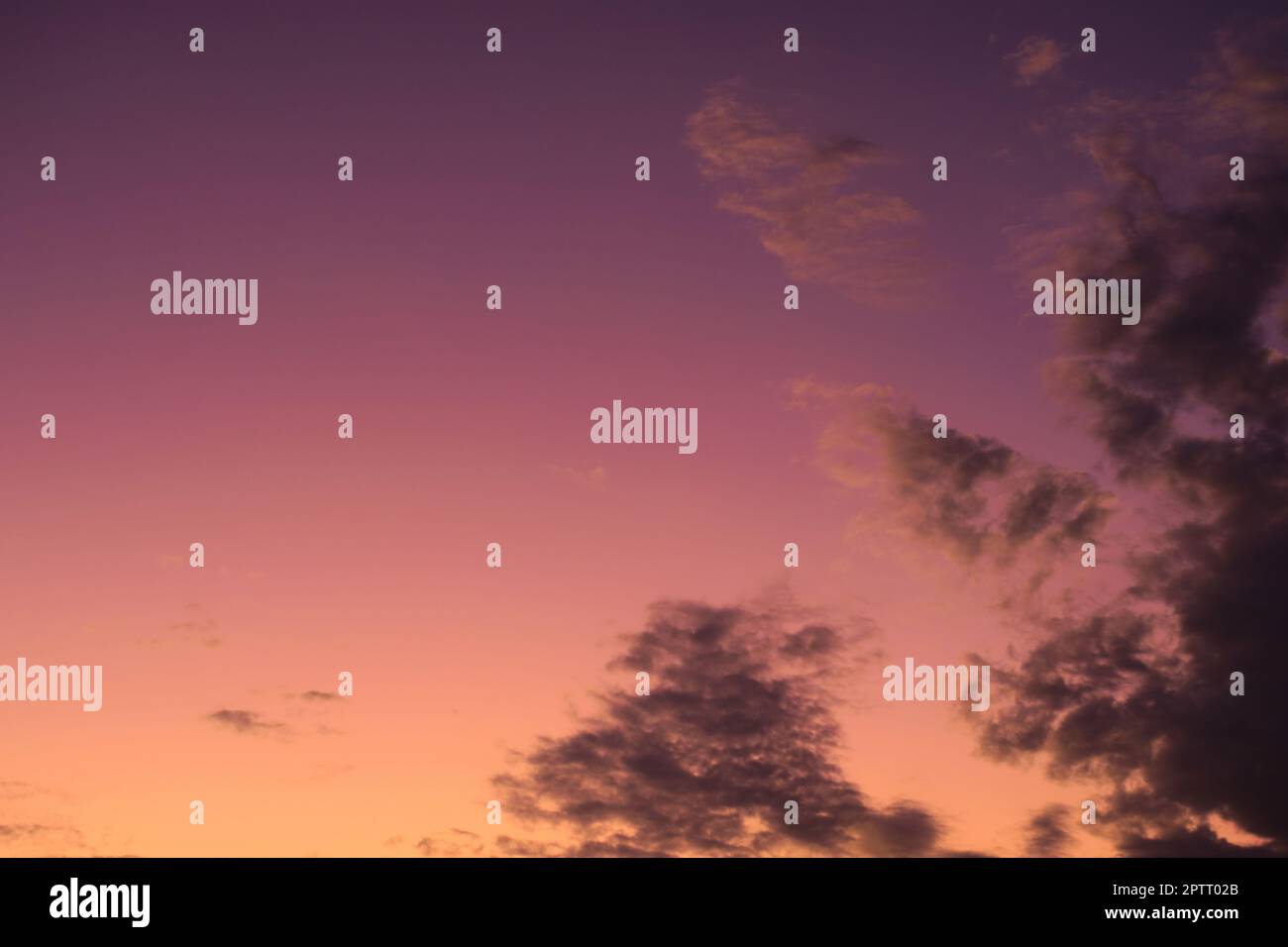 Colorful twilight summer sky with sparse, light clouds. Stock Photo
