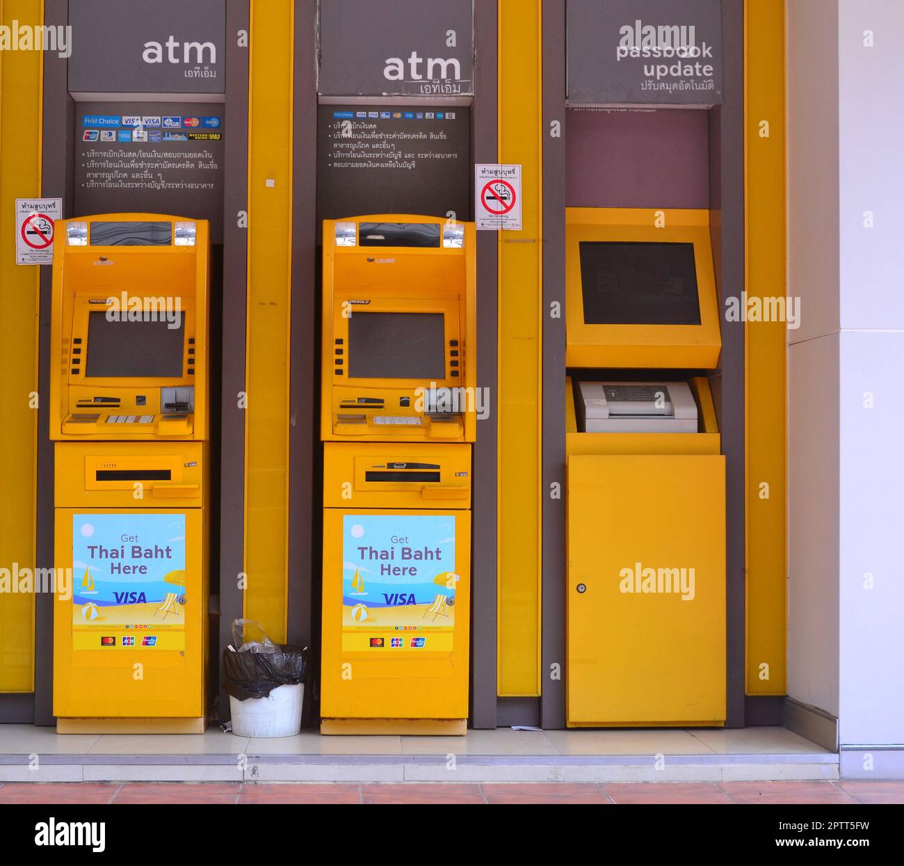 ATM's and a passbook update machine operated by Krungsri Bank, in Thailand, Asia. Stock Photo