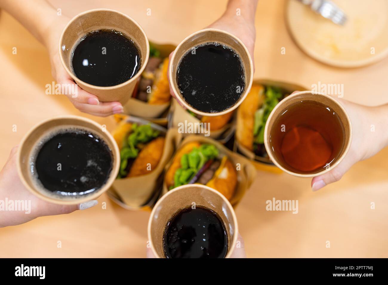 Paper cup with soft drink at party time Stock Photo - Alamy