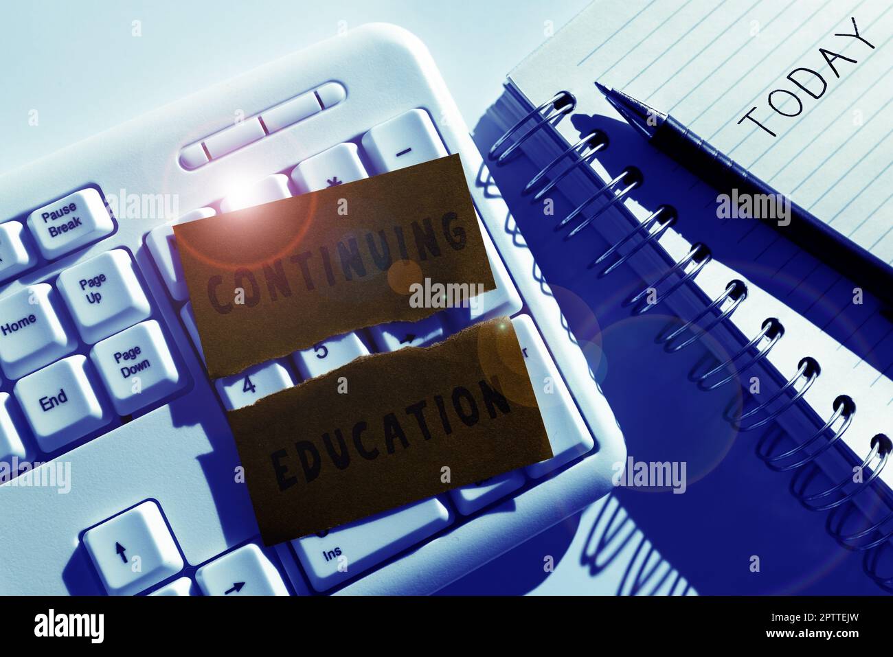 Hand writing sign Continuing Education, Concept Continued