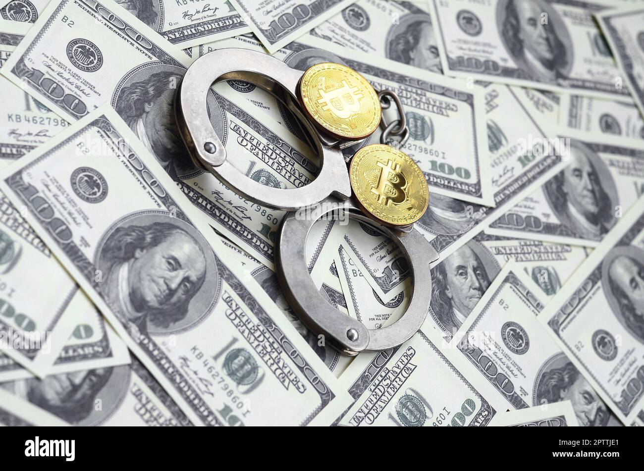 Golden handcuffs hi-res stock photography and images - Page 2 - Alamy