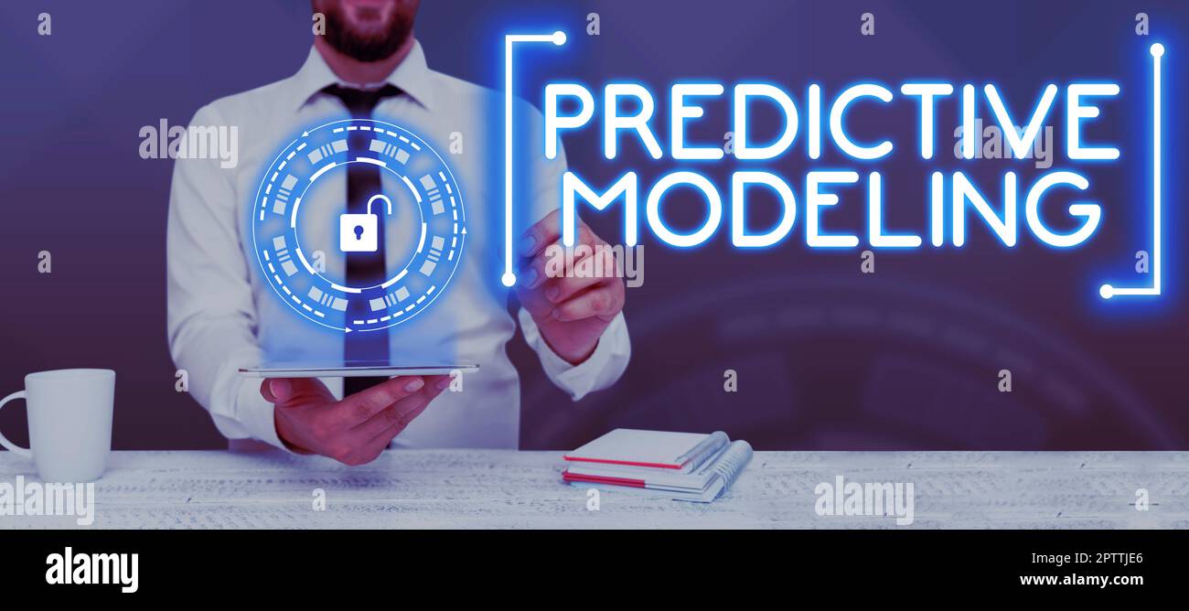 Hand writing sign Predictive Modeling, Word for maintenance strategy driven by predictive analytics Stock Photo