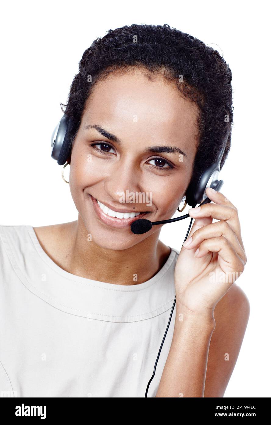 Ive got the answers you need. Studio shot of a young woman wearing a headset isolated on white Stock Photo