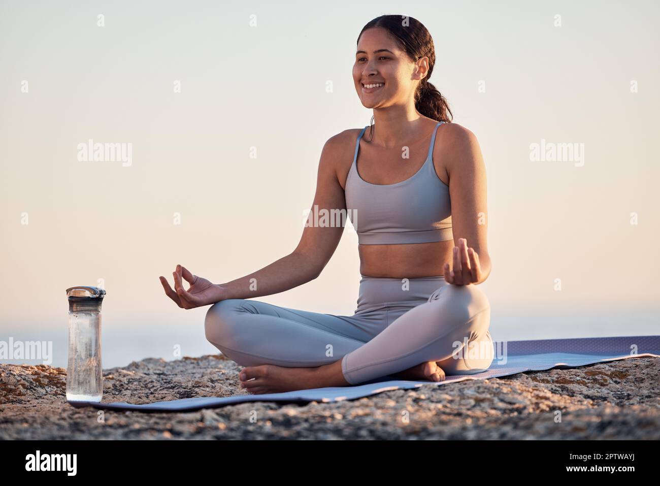 zen meditation, woman and relax outdoor for healthcare wellness, mindfulness or chakra energy health. Reiki, yoga fitness training and healthy mindset Stock Photo