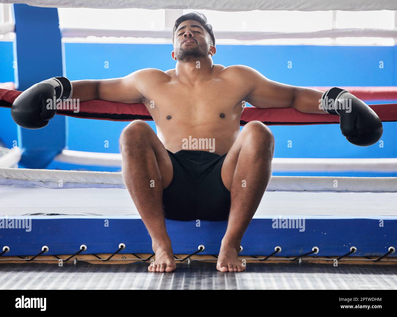 Tired, lose and boxer sad about a fight, boxing fail and burnout in a