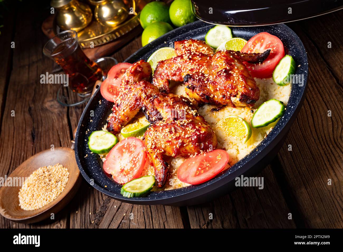 couscous with fried chicken wings spicy Stock Photo Alamy