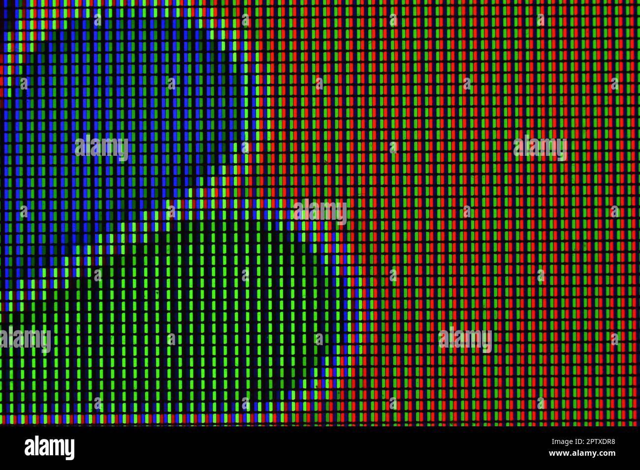 Close up view of magnified LED TV panel showing grid of tiny pixels with  different colors emission intensity Stock Photo - Alamy