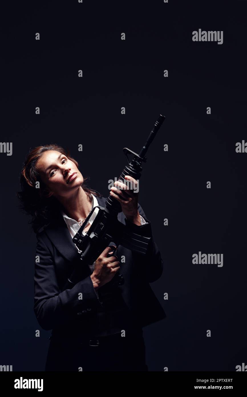 Woman pointing rifle at worker hi-res stock photography and images - Alamy