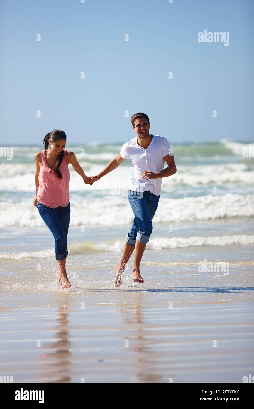Black couple enjoying beach together hi-res stock photography and images -  Alamy