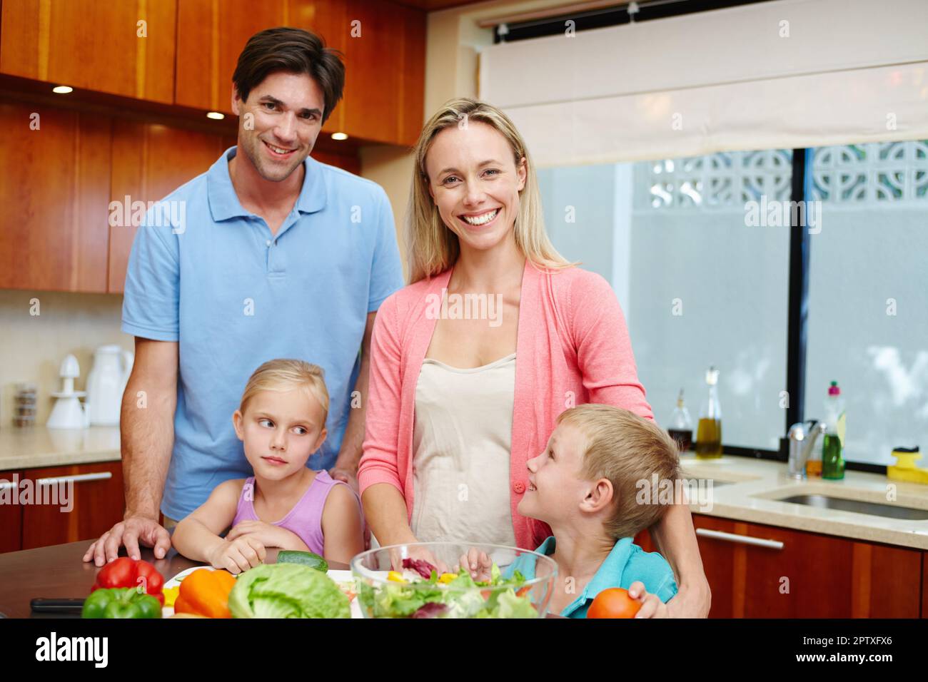 Choosing the healthy option. Portrait of a happy family of four