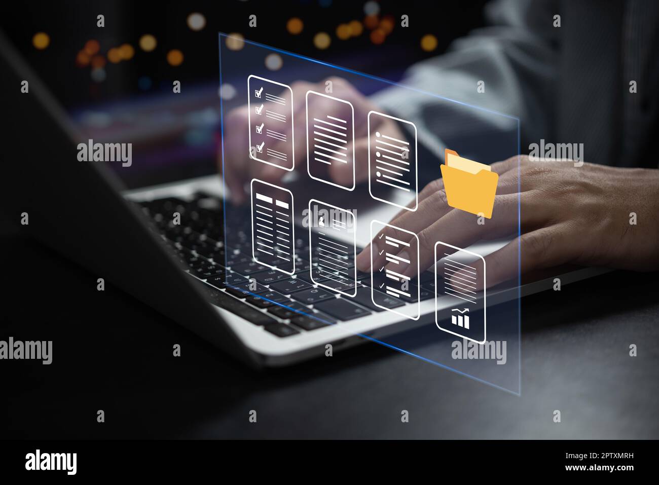 Businessman working online data and document system on laptop with virtual screen. Online database and document management system and keep in security Stock Photo