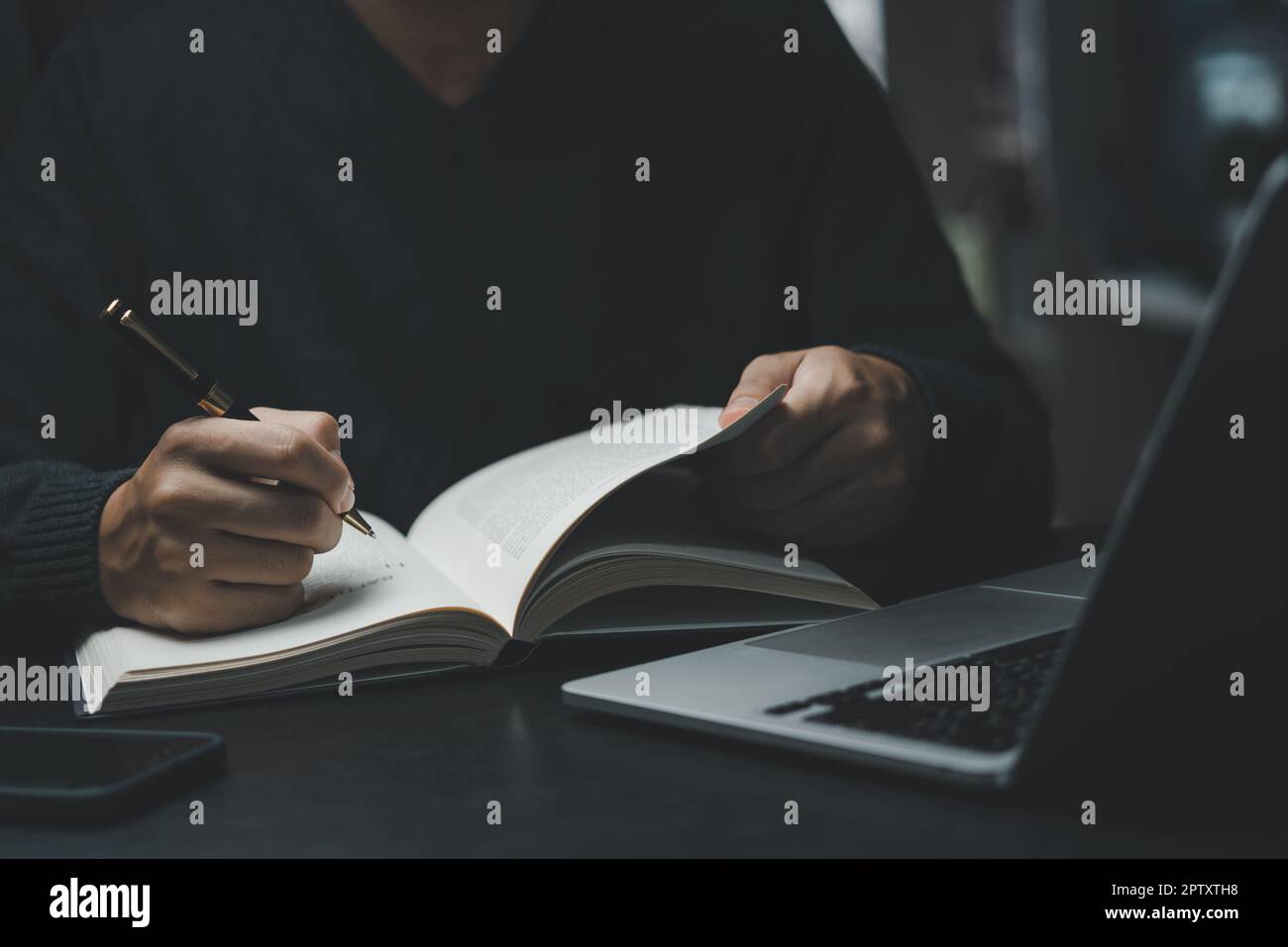 Shane Writing man hands with pen writing on notebook in the office.learning ...