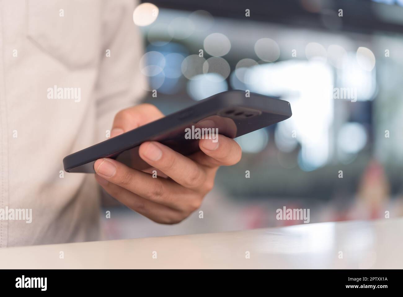 man using mobile smart phone.Digital technology communications concept. Stock Photo
