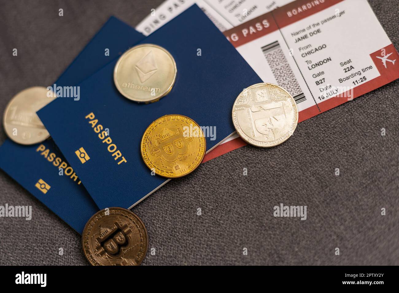 Passport, bitcoin, the airplane background. The concept of travel Stock