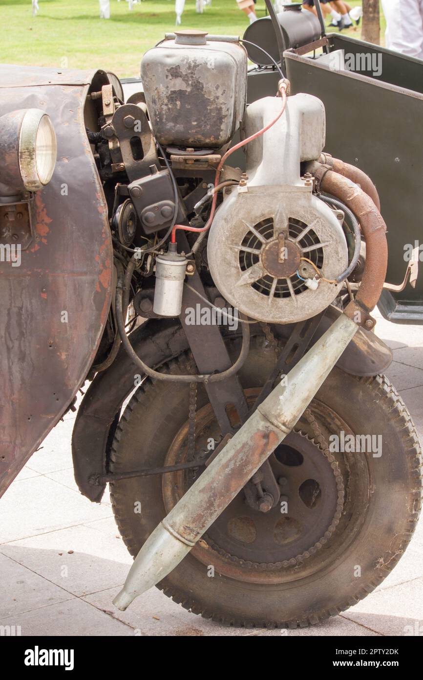 Vintage car engine on the front wheel Stock Photo - Alamy