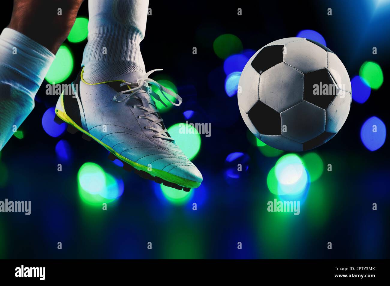Football player ready to kicks the soccer ball Stock Photo