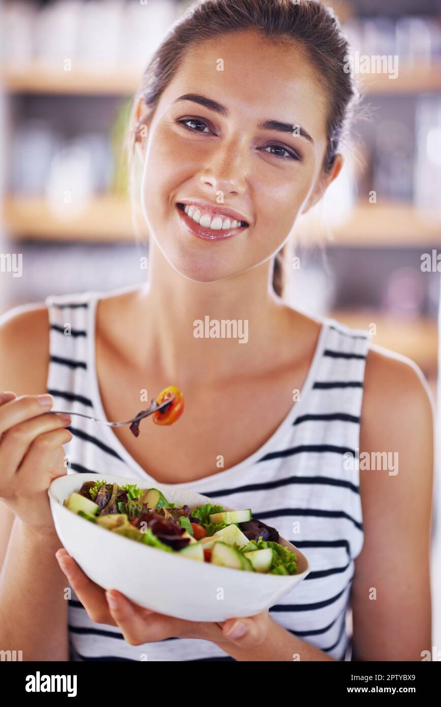 The healthy choice. a beautiful young woman at home Stock Photo