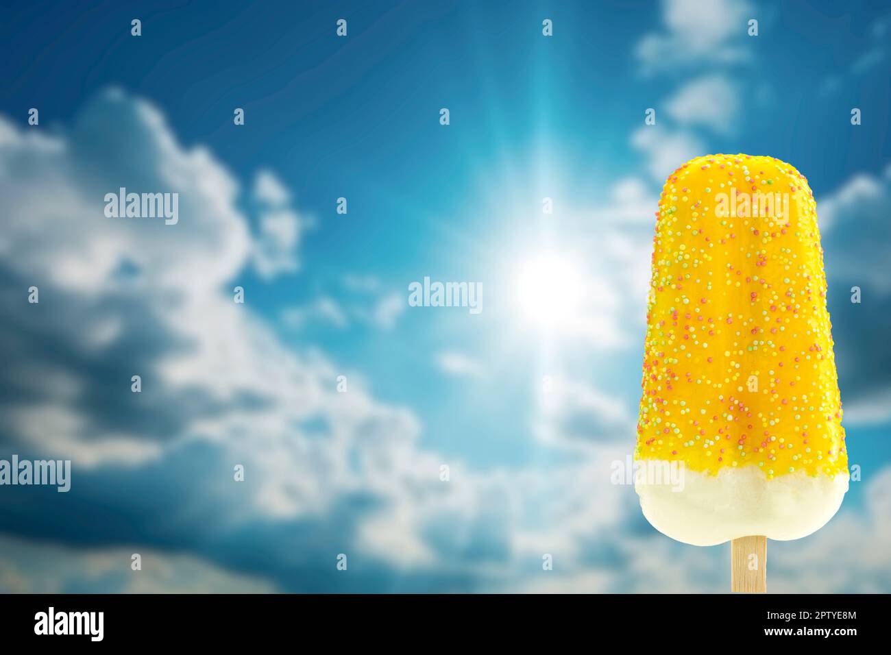 Bright fruit ice cream on a stick on a summer concept background ...
