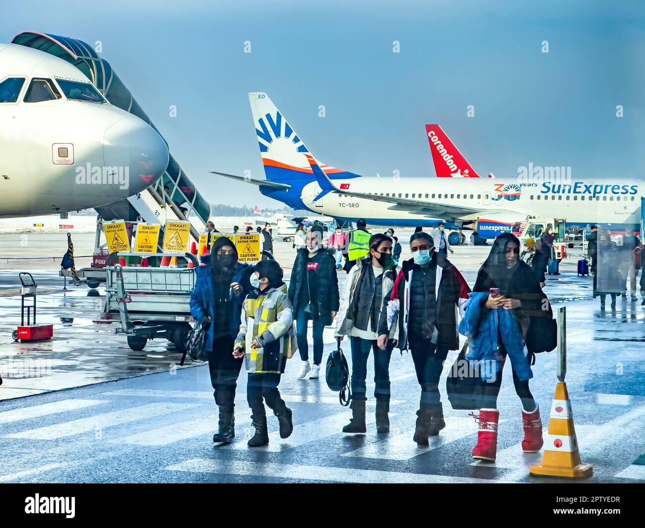 Kayseri, Turkey, 07.21.2022; Passengers walking at runway of Kayseri