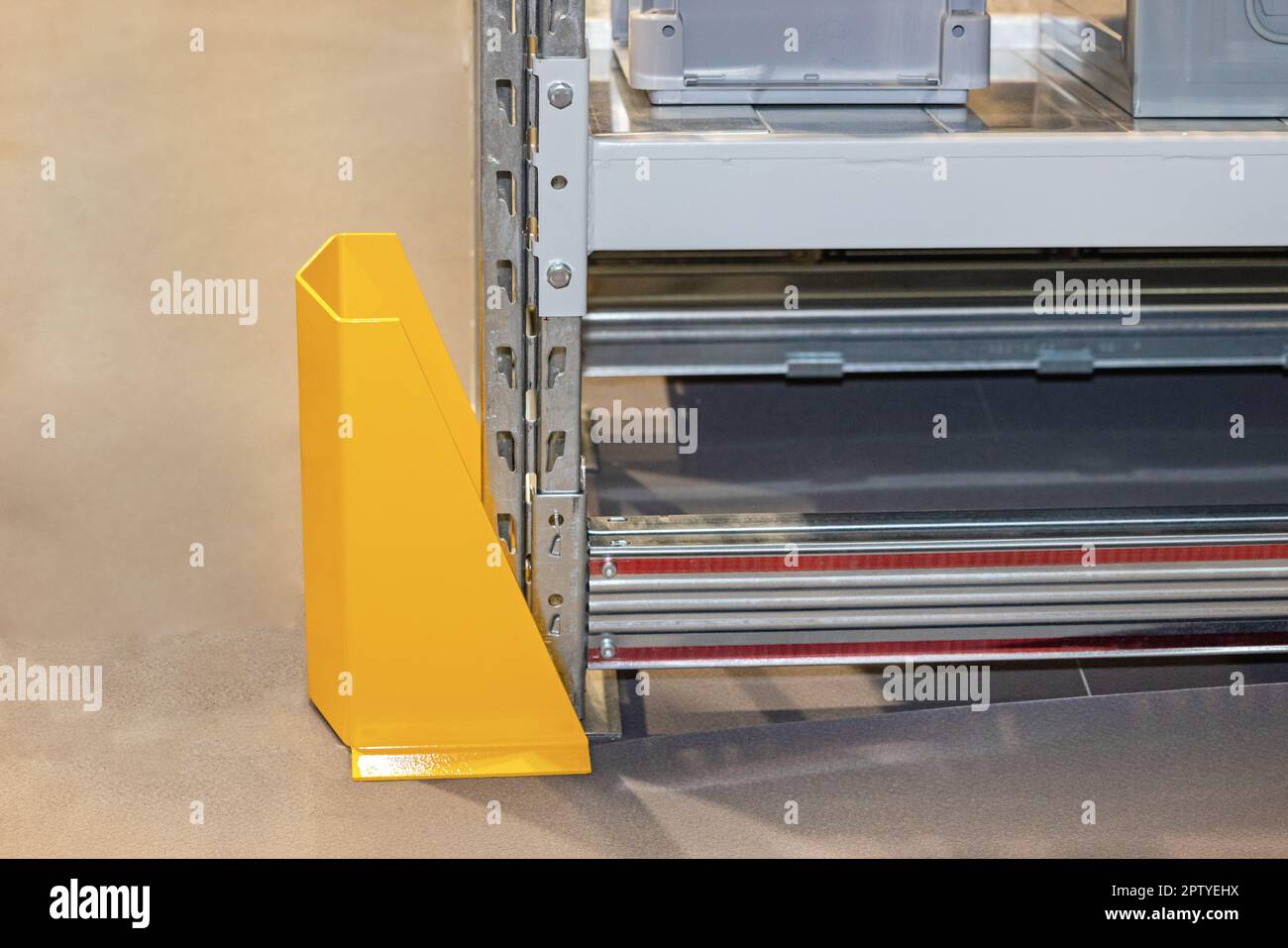 Bright Yellow Racking Corner Post Protector in Warehouse Stock Photo