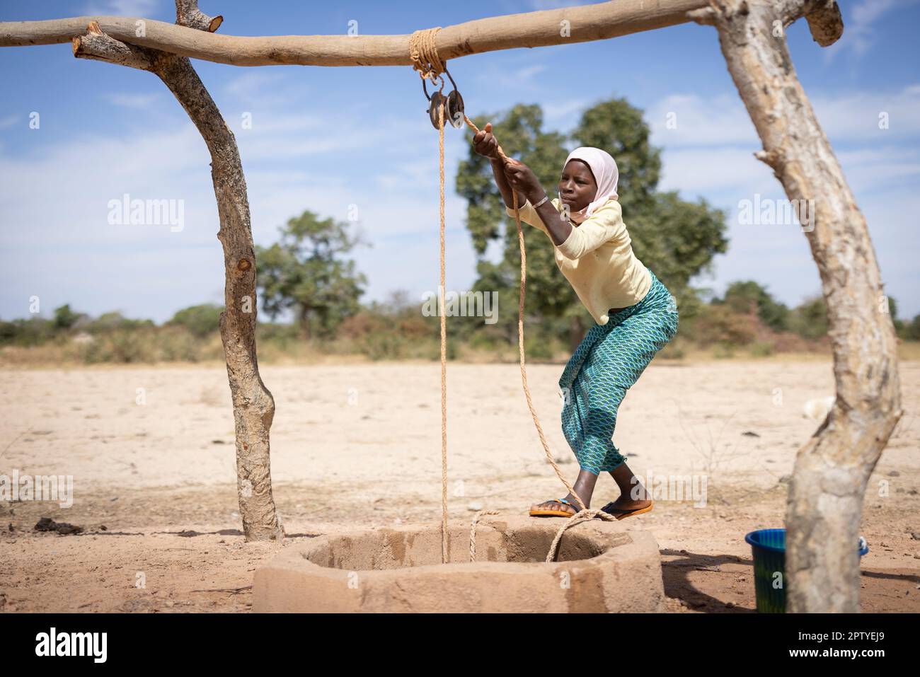 IDP girl fetching water in Segou Region, Mali, West Africa. 2022 Mali drought and hunger crisis. Stock Photo