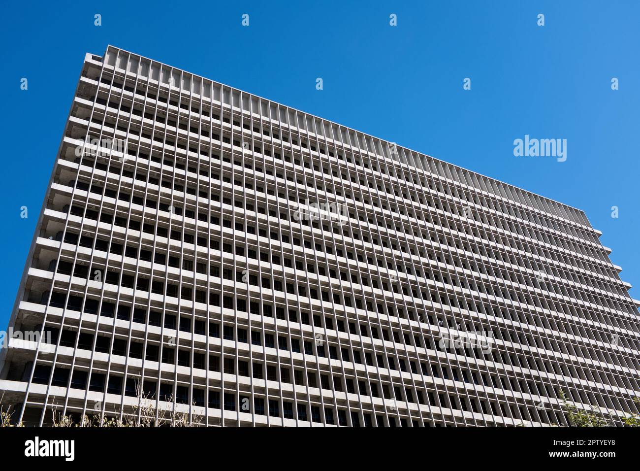 Modern Office Building Exterior against Blue Sky Stock Photo