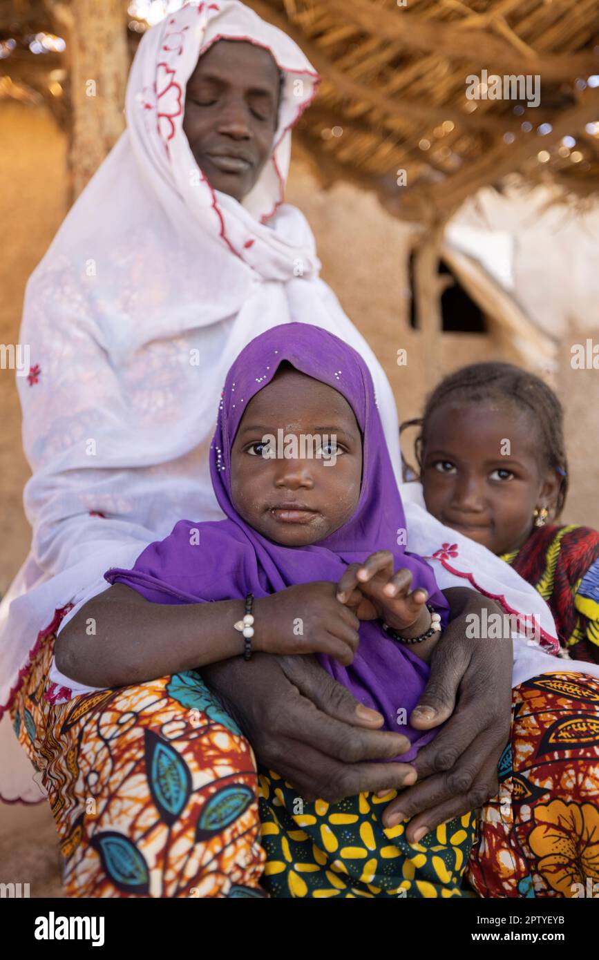 Fulani girls with their mother in Segou Region, Mali, West Africa. 2022 Mali drought and hunger crisis. Stock Photo