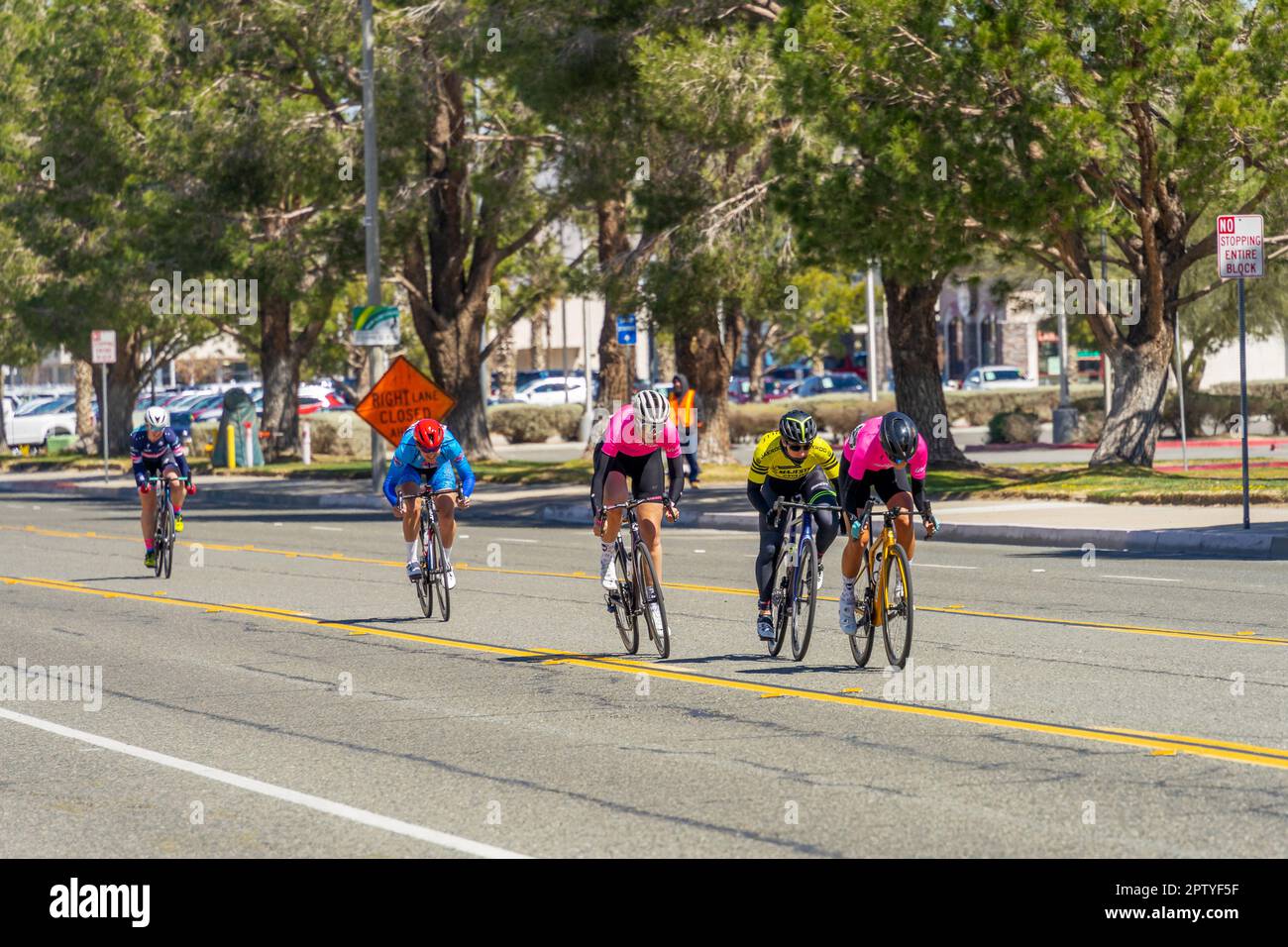 Victorville, CA, USA – March 26, 2023: Group of women’s in a cycling road race held by Majestic Cycling in Victorville, California. Stock Photo