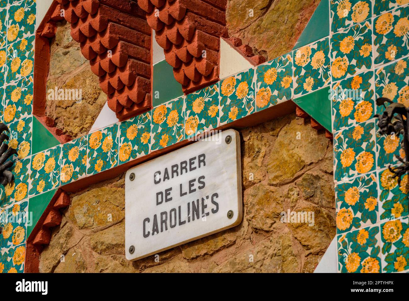 Detail of the exterior facade of the Casa Vicens, designed by Antoni Gaudí, with the sign of the Carolines street (Barcelona, Catalonia, Spain) Stock Photo